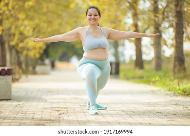 Fat woman jogging, doing sports for weight loss, obesity problem. High quality photo.