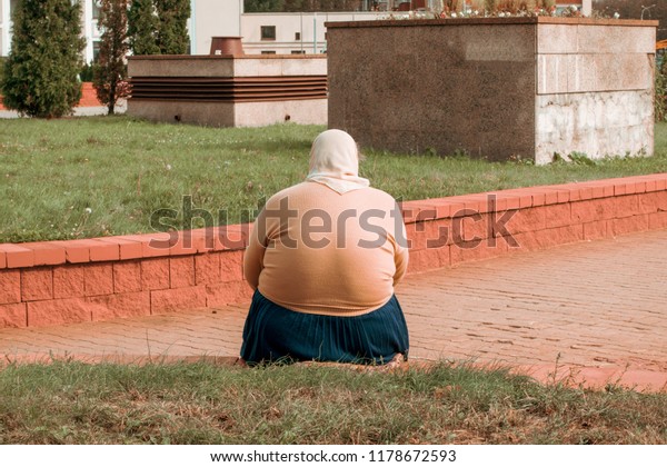 Fat Woman Sitting On Bench Stock Photo Edit Now 1178672593