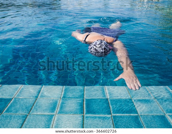 Fat Woman Swimming Pool 600w 366602726 