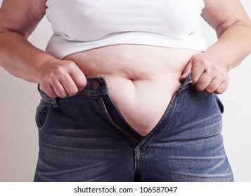 Fat woman trying to wear jeans