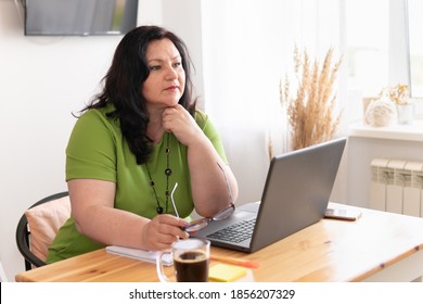 Chubby mature on a table