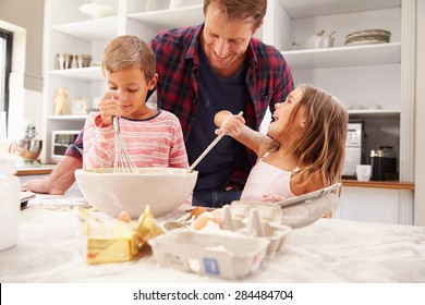 Father Baking With Children