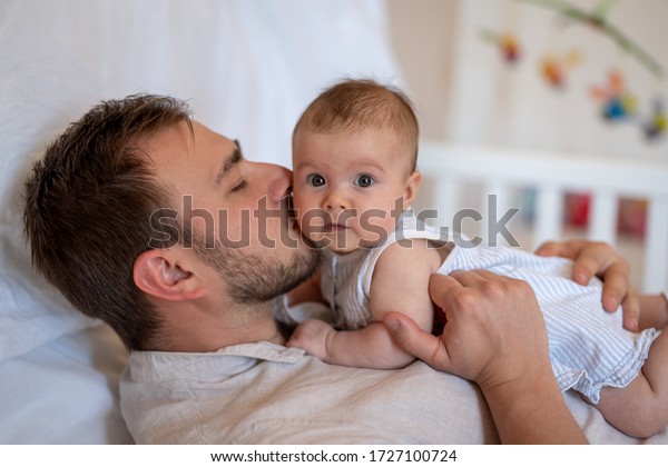 Father Bonding His Baby Girl While Stock Photo 1727100724 | Shutterstock