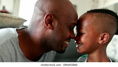 Father And Boy Bonding Together. Eskimo Kiss