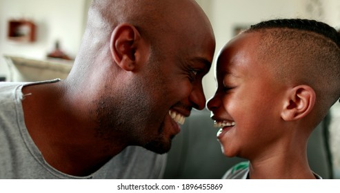 Father And Boy Bonding Together. Eskimo Kiss