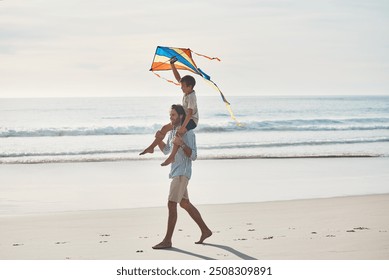 Father, boy and walking on beach with kite, water and carrying for travel, holiday and bonding as fun. Man, son and shoulder ride by ocean with support, love and care for trip, vacation and playing - Powered by Shutterstock