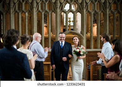 Father Of The Bride Walking His Daughter Down The Aisle