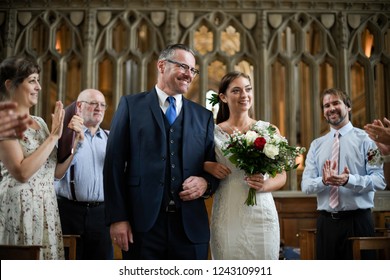 Father Of The Bride Walking His Daughter Down The Aisle