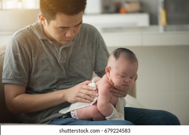 Father Burping Baby Boy After Meal