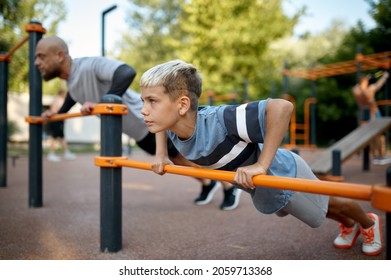 Father and child doing exercise, sport training