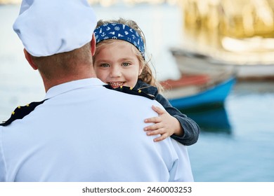 Father, child and marine uniform with hug or sailor captain at ocean for service duty, reunion or embrace. Man, daughter and happiness greeting for travel return or patriotic hero, family or navy - Powered by Shutterstock