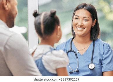 Father, child and nurse talking for health care in a hospital while happy at consultation. African woman pediatrician or doctor, man and kid patient for medical check, family insurance or development - Powered by Shutterstock