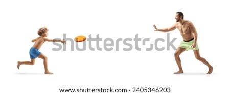 Father and child in swimming shorts playing with a flying disc isolated on white background