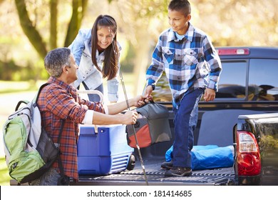 Father Children Unpacking Truck On Camping Stock Photo 181414685 ...