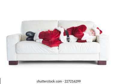 Father Christmas Sleeps On A Couch On White Background