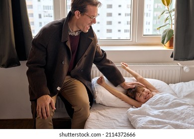 Father Come To Say Goodbye To Child Boy Before Leave For Work In Morning, On Bed. Chirtless Kid Boy Is Lying On Bed Sleeping, Time To Say Goodbye, Have A Nice Day. Bedtime, Morning Routine, Lifestyle