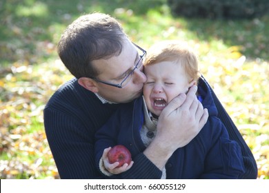 Father Comforts Crying Son Child