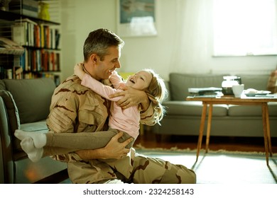 Father coming home to his daughter from deployment - Powered by Shutterstock