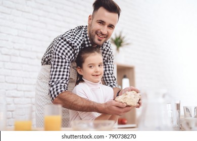 Father Is Coocking With Daughter. Father's Day.