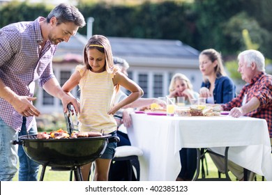 Father Daughter Grilling Stock Photos, Images & Photography ...