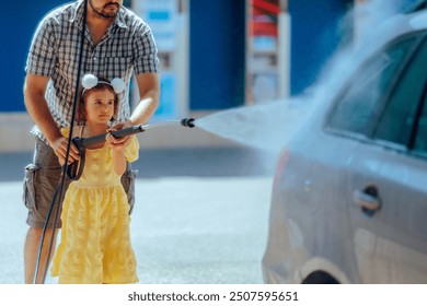 

Father and Daughter Cleaning the Car at DIY Car Wash. Bonding activity between little girl and her dad 
 - Powered by Shutterstock