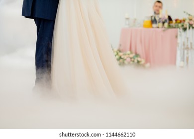 Father And Daughter Dance At The Wedding. Dancing In The Fog. Groom At The Background, Watching Them