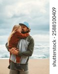 Father and daughter hugging family lifestyle outdoor child girl with daddy together walking on the beach summer vacations parent love happy moments candid emotions Fathers day holiday