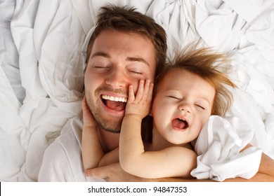 Father and daughter laughing and bonding