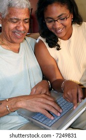 Father And Daughter On Computer