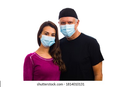Father And Daughter Portrait Wearing A Mask On A White Background.