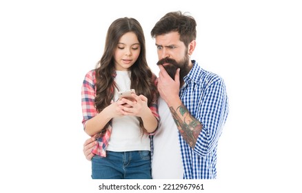 Father And Daughter Set Up Smartphone. Modern Technology. Little Girl With Father. Small Child And Dad Explore Smartphone. Download Application For Smartphone. Guide For Adults. User Experience