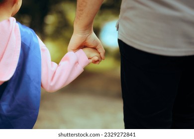 
Father and Daughter Wearing Superhero Cape Holding Hands. Happy family talking a walk outside together 
 - Powered by Shutterstock