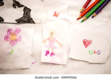 Father Day Concept, Kid Draw And Writing Heart Shape And Dad Word On Paper. 