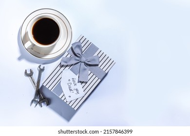 Father Day Greeting Card Background. Fathers Day Concept With Gift Box, Tools And Ties, Coffee Cup, Gift Tag  Love You Dad, On Rustic Wooden Background Top View Copy Space