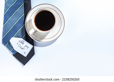 Father Day Greeting Card Background. Fathers Day Concept With Gift Box, Tools And Ties, Coffee Cup, Gift Tag  Love You Dad, On White Background Top View Copy Space