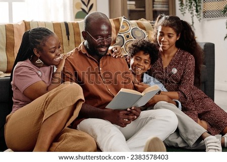 Father of Family Reading Book