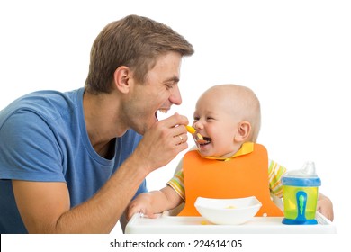 Father Feeding Baby Son