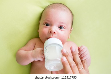 Father Feeding Milk His Baby Infant From Bottle