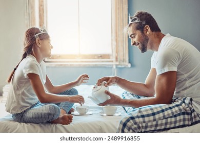 Father, girl and happy for tea party in home with tiara, princess and drink for fantasy game in bedroom. Man, dad and child with crown, playful and care with love for bonding in royal family house - Powered by Shutterstock