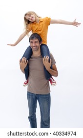 Father Giving Happy Daughter Piggy Back Ride Against White Background