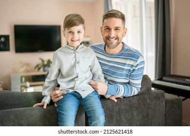 A Father Or Godfather Having Fun On The Living Room At Home