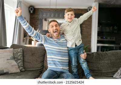 A Father Or Godfather Having Fun On The Living Room At Home Hand High