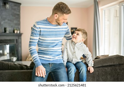 A Father Or Godfather Having Fun On The Living Room At Home