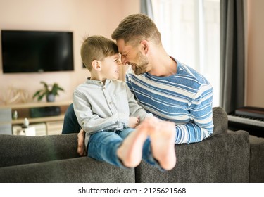 A Father Or Godfather Having Fun On The Living Room At Home