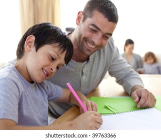 Father helping his son doing homework at home  Social distancing   self isolation in quarantine lockdown for Coronavirus Covid19
