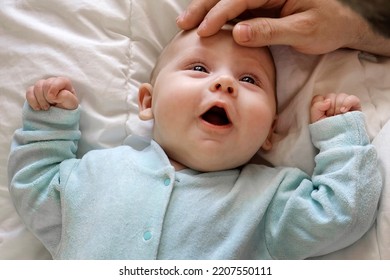 Father With His Daughter, Tiny Infant. Newborn Baby Smiling, Laughing And Looking Up At Daddy. Man Showing Affection To His Child. Candid Emotion Of Beard Dad And His Baby. Authentic Lifestyle Shot