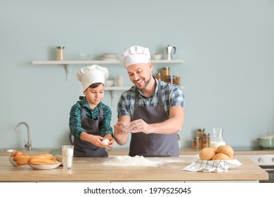 Father and his little son cooking in kitchen - Powered by Shutterstock