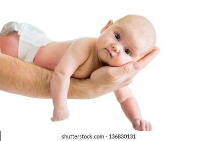 father holding baby in his hand isolated on white