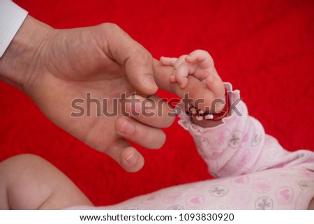 Father Holding Babys Hand ,