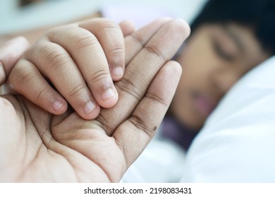 Father Holding His Child Hand Close Up 